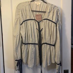 Flouncy Blouse that gives this Boho meets Bridgerton. Light sage w/ navy ties